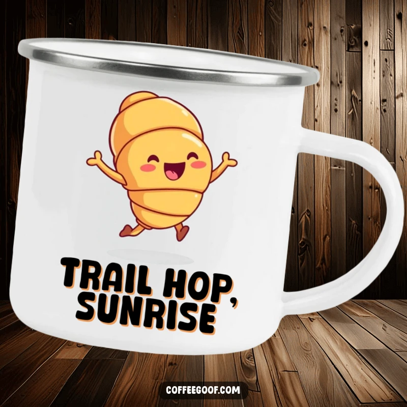 Funny Camping Mug showing a joyful croissant character hopping, perfect for outdoor enjoyment and as a whimsical, funny gift.