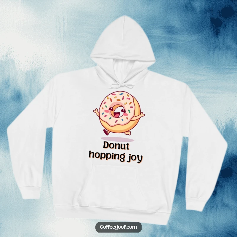 Funny donut character with bouncing sprinkles joyfully hopping, printed on a soft hoodie for cozy, sweet enjoyment.